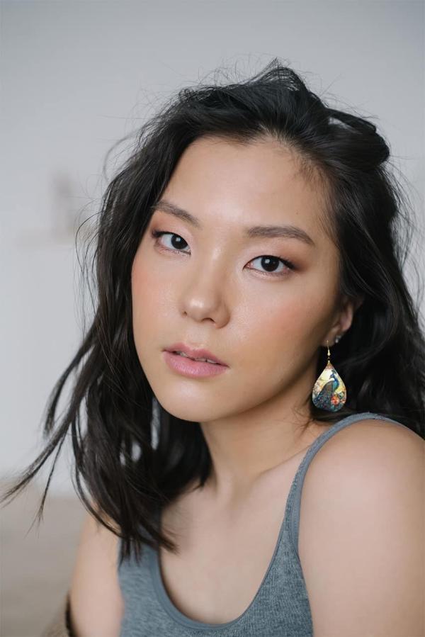 sun-kissed-asian-peacock-teardrops-on-pretty-asian-woman